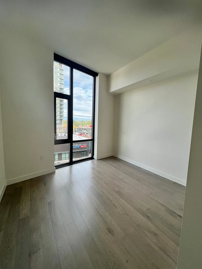 Tall windows in guest room - 889 103rd Ave NE