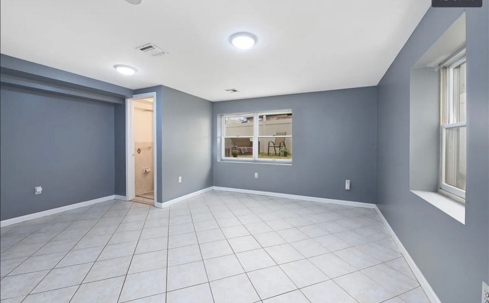 Lower level: bedroom, living or office - 216 Angelique St