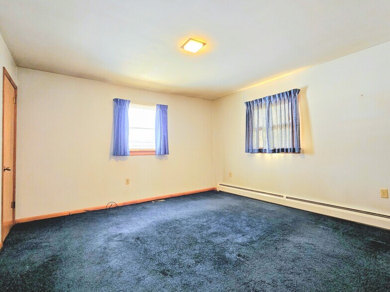 Building Photo - 8409 Lancaster Ave