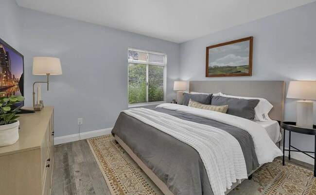 Building Photo - Turnkey ground floor condo in the coveted ...