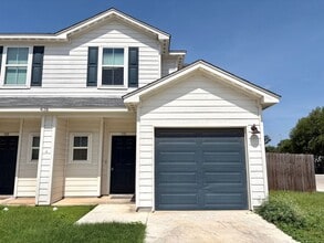 Building Photo - Corner Unit Townhome with 3 Bedrooms, Garage & Private Yard