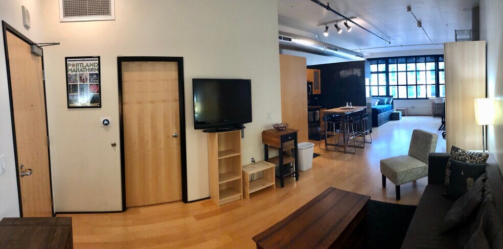 Full space from front door facing into the unit -- alternative furnishing/layout - 1400 NW Irving St