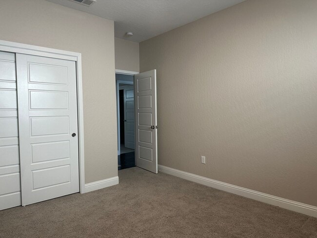 Building Photo - Modern home in a modern community featuring upgraded amities, solar, community pool + Close to Co...