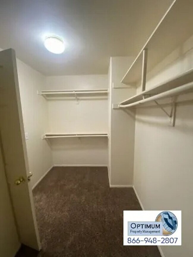 Building Photo - Spacious 4-Bedroom Home with 3-Car Garage & Downstairs Suite!