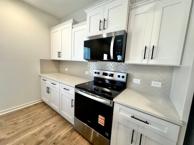 Building Photo - NEW 4 br 2.5 ba with loft and private study in the Kensington community READY MAY 2026