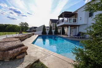 Building Photo - 4 Bedroom, 4 Bath Home w/Backyard Heated Pool overlooking Pearl's Fen
