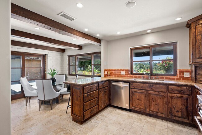 Building Photo - This Beautiful Hacienda Style Home combine...