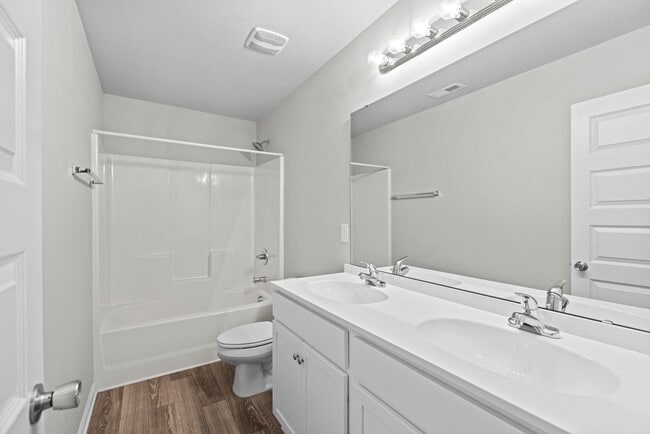 Building Photo - 50% off the first months rent if a lease is signed by 1/15