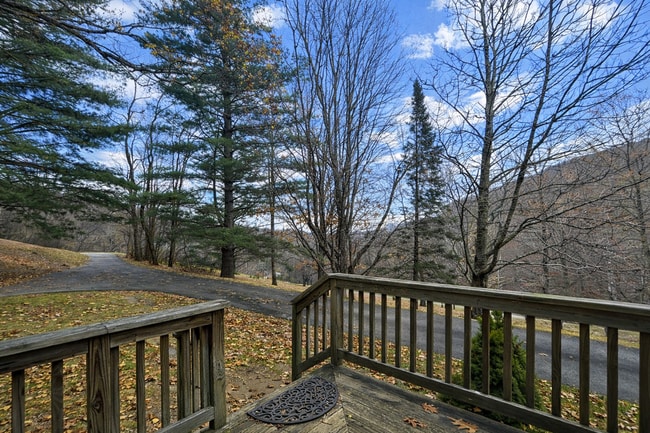 Building Photo - Light-Filled 3BR Home with Wraparound Deck, Convenient to Town