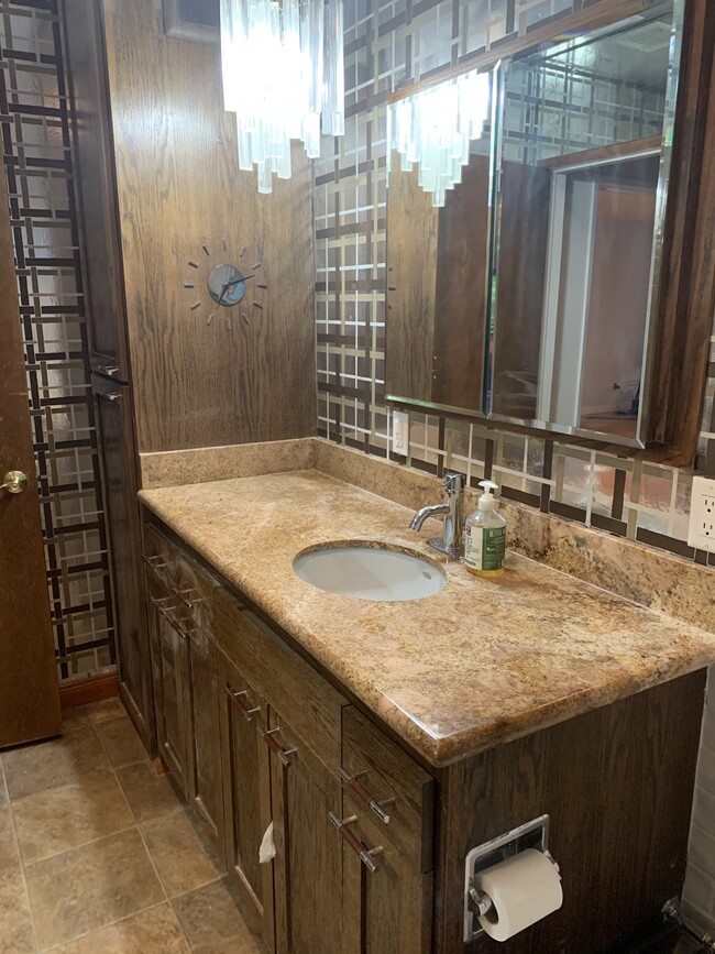 Bathroom sink with brand new faucet - 1914 W Alameda Ave