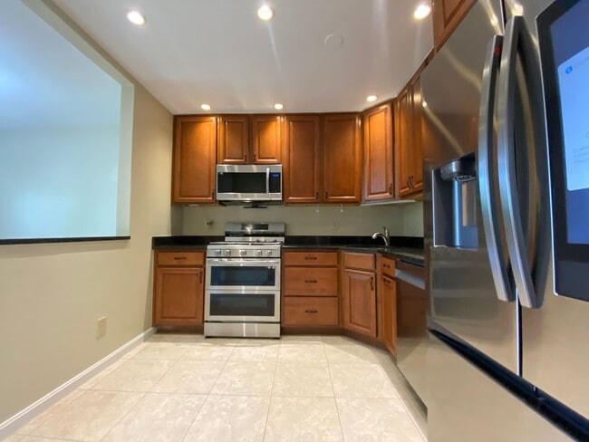 Building Photo - A fully updated Four Bedroom, Three and On...