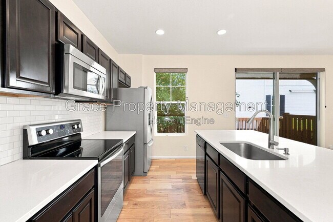 Building Photo - 8562 E 49th Pl