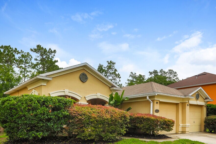 Building Photo - 11311 Justin Oaks Dr N