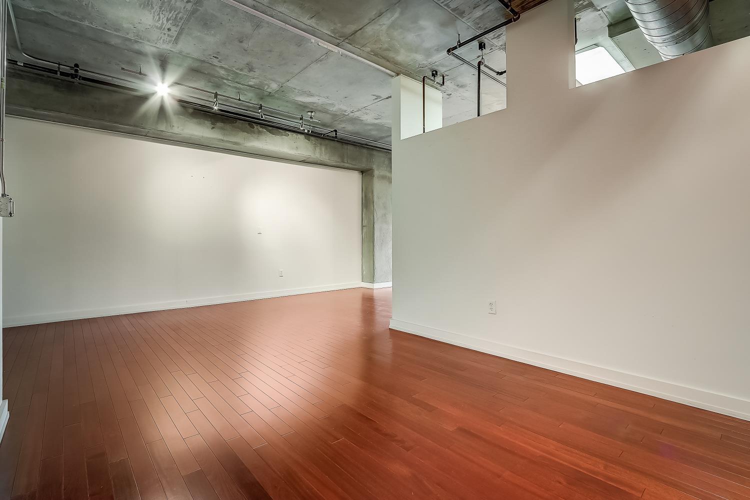 bedroom looking into open area - 645 W 9th St