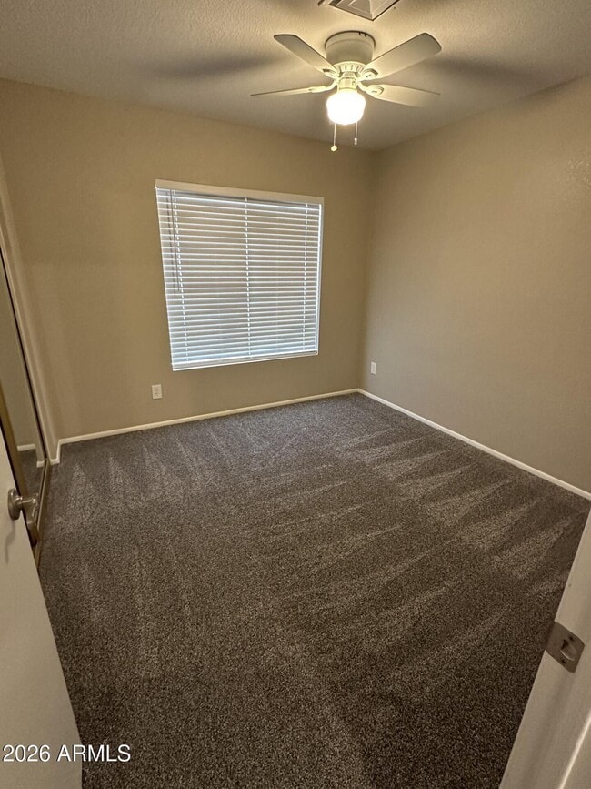 Building Photo - 8663 N 107th Dr