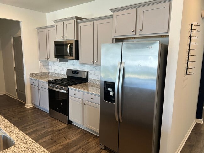 Building Photo - Four-Bedroom, Three-Bath, Unfurnished Hous...