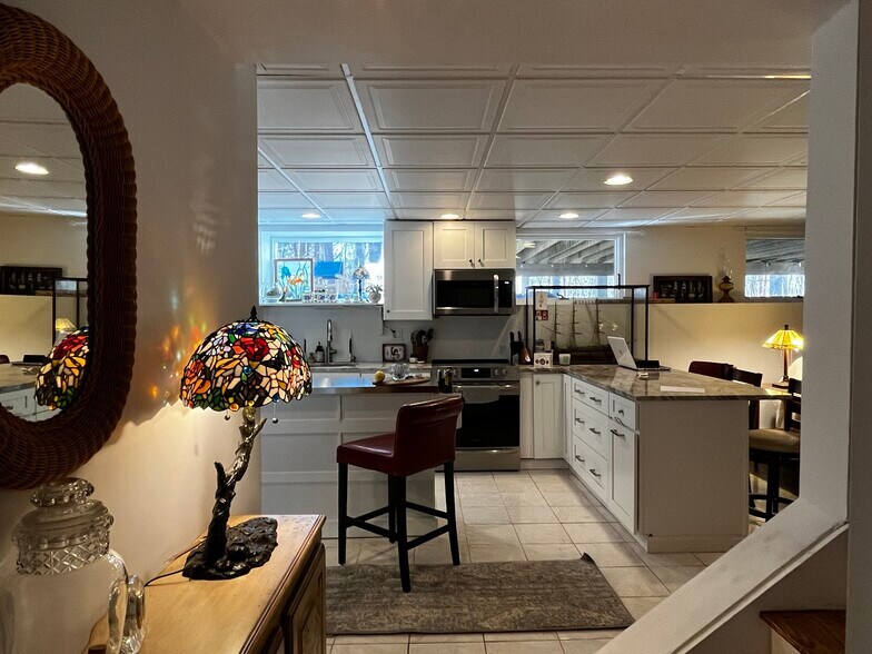 Spacious kitchen & center island workspace - 142R Page Rd