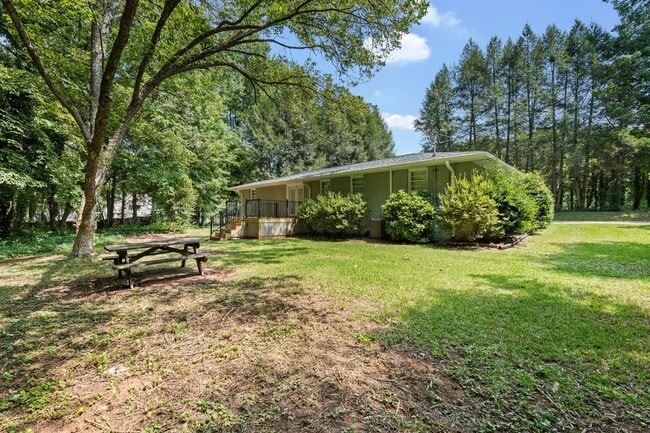 Building Photo - Charming, Newly Remodeled 3 BR, 1.5 BA Home with Fenced Yard on Large Private Lot