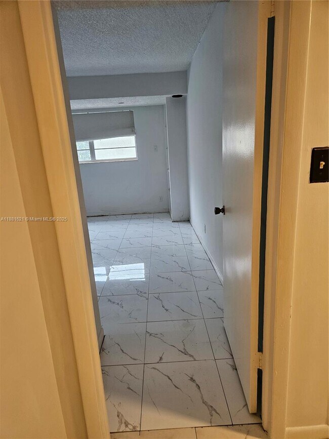 Building Photo - 11131 Royal Palm Blvd