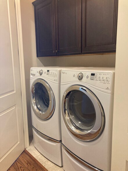 Shared front loading washer and dryer on third floor - 15927 Morgan St