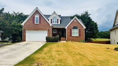 Building Photo - 5BR/3.5BA Home in a Swim/Tennis Community ...
