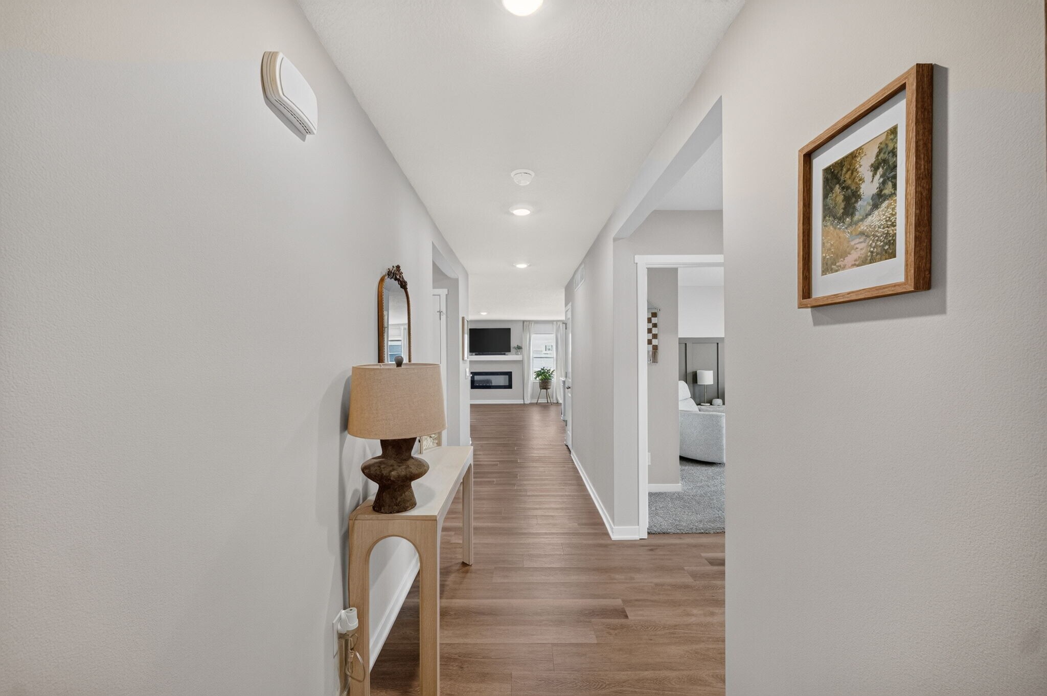 hallway leading to bedrooms, bath and laundry - 1080 Bel Aire Ct