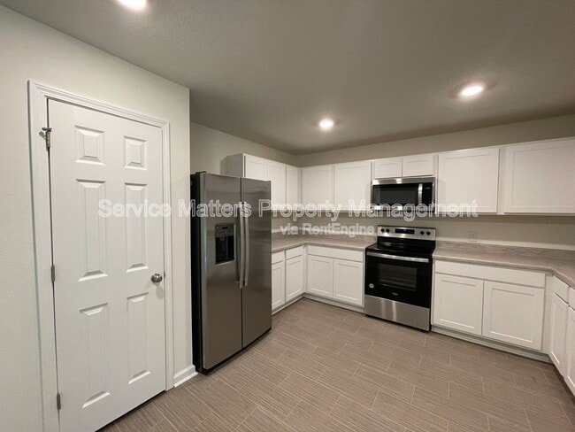 Building Photo - 6521 June Bug Dr