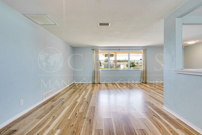 Building Photo - Welcome to your Perfect Beachside Retreat!