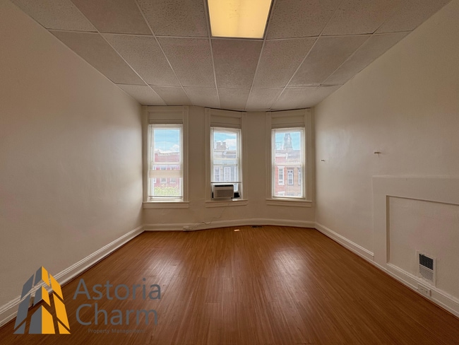 Building Photo - Updated 4 BR Home with Spacious Yard & Pre...