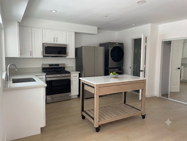 Building Photo - 1 Month Free!Brand New Thai Town Studio w/ All Utilities Included!
