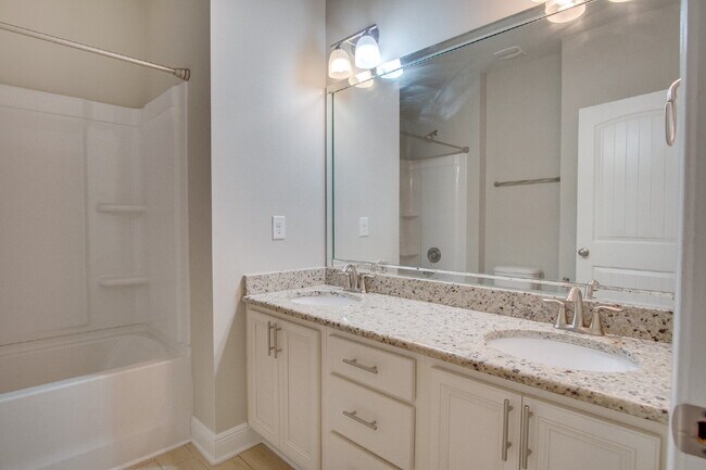 Building Photo - Spacious 4BR Pool Home with Modern Upgrade...