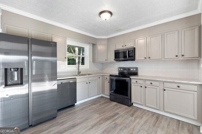Building Photo - 6941 Stephens Dr