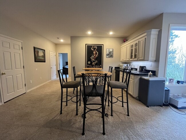 Building Photo - Executive-Style Northwest Heights Home with Forest Views and Refined Architectural Details