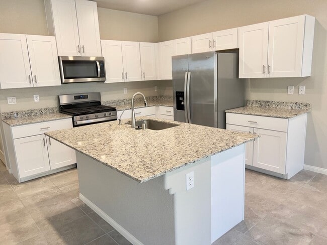 Building Photo - 4 bedroom, 2.5 bathroom home located in North West, Las Vegas