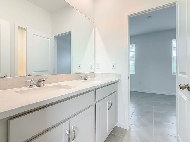 Building Photo - New Luxury Townhome in Celebration with All porcelain tiled floors. Island Village new construction