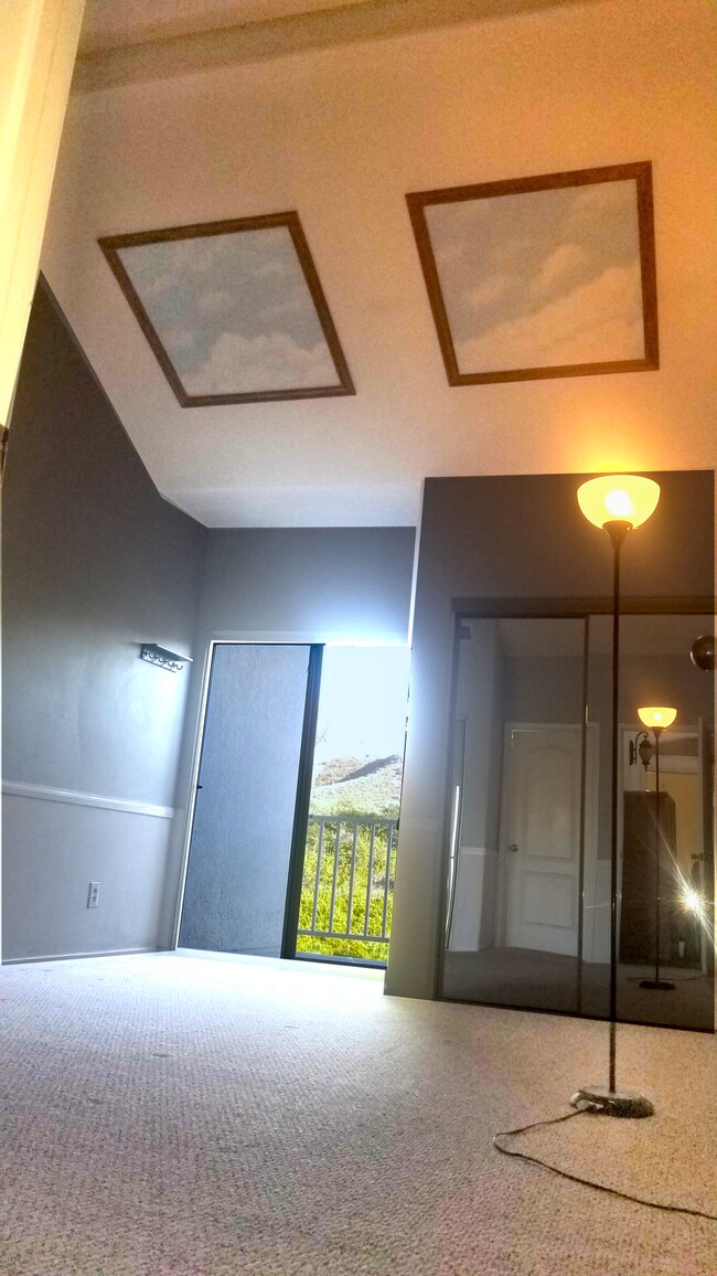 Second Bedroom : showing one of two mirrored closets and terrace door (left) with views to mountains - 18118 Flynn Dr