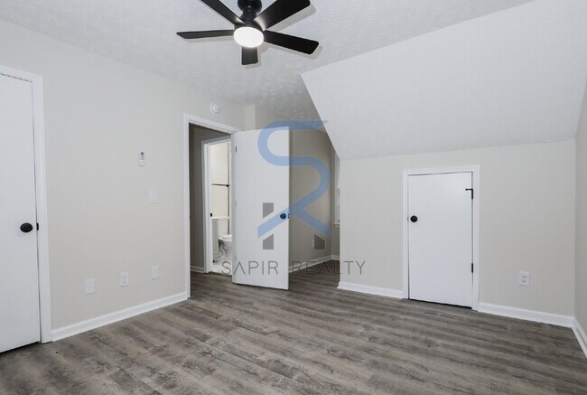 Building Photo - Move in before December 31st and choose your reward: a $250 Amazon Gift Card or a 55" Smart TV!