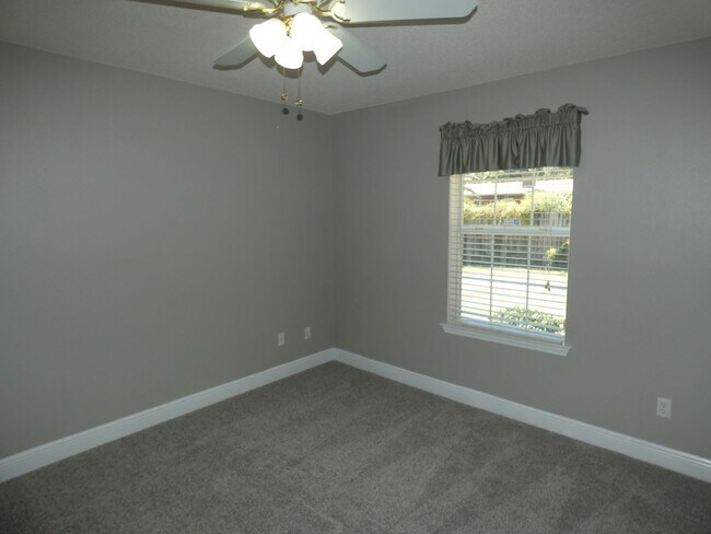Building Photo - Charming 4-Bedroom Home With Sunroom