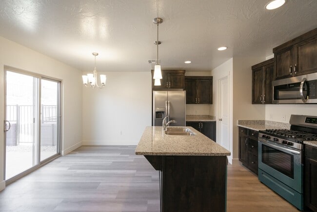 Building Photo - Modern 4-Bed Stand-Alone Home with Fenced Patio