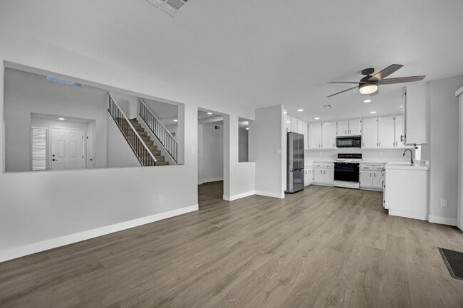 Building Photo - Step into this charming 3-bedroom, 3-bathroom home that has so much to offer!