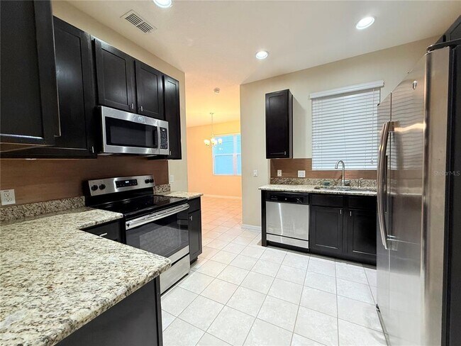 Building Photo - 12837 Tanja King Blvd