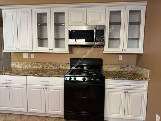 Building Photo - New Year Special! 50% Off First Months Rent!