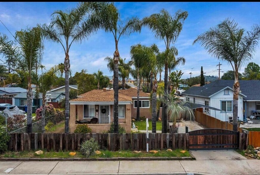 Front view; gated carport. - 529 S Sunshine Ave