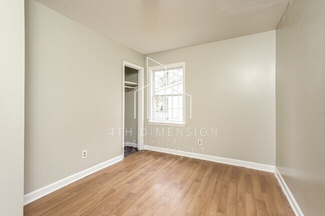 Building Photo - Charming 4-Bedroom Rental with Hardwood Fl...