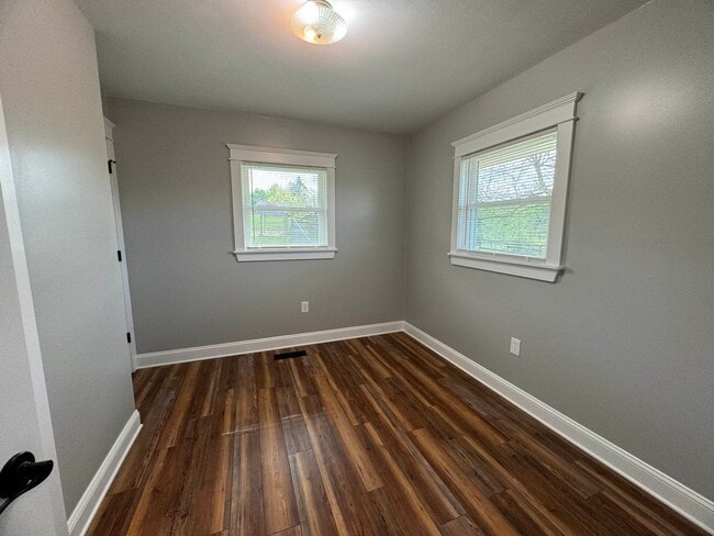 Building Photo - Exquisite Brick Ranch with Modern Upgrades, Countryside Charm And Two Car Garage