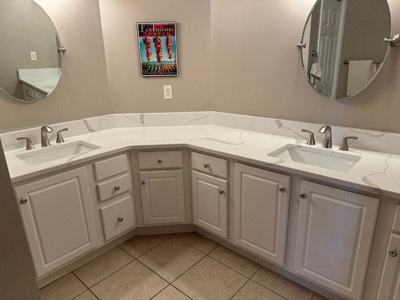 Master bathroom (picture is approx from another unit) Countertop will be White Calcutta Quartz - 5827 Pierce St