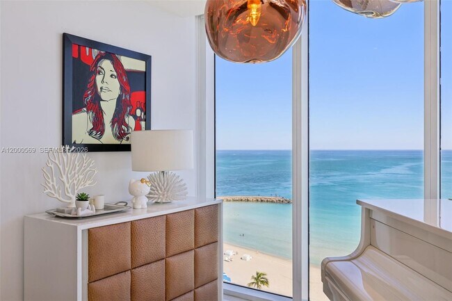 Building Photo - 10275 Collins Ave