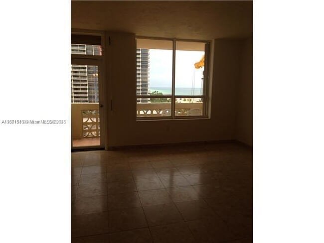 Building Photo - 10185 Collins Ave