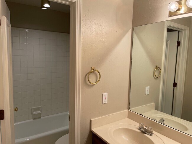 Building Photo - Beautiful granite and tile backsplash to update the large kitchen. 3 bedrooms + an office, large ...
