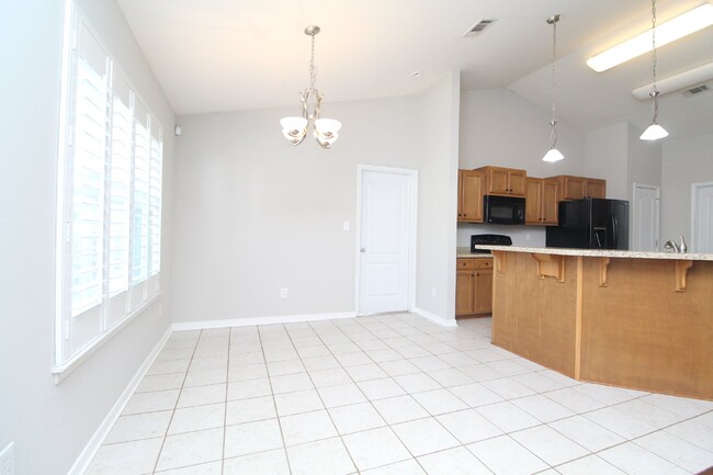 Building Photo - Updated 4BR Home Near NAS - Split Floor Pl...